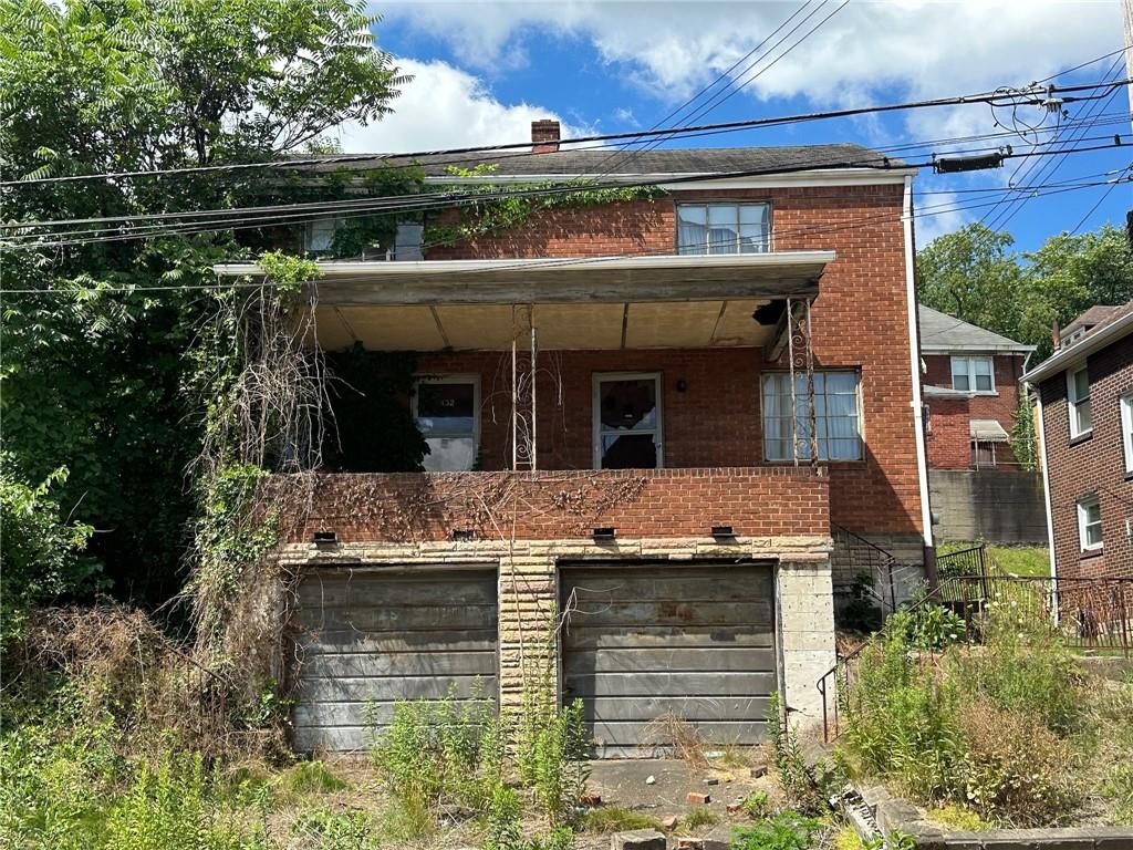 a view of house with outdoor space