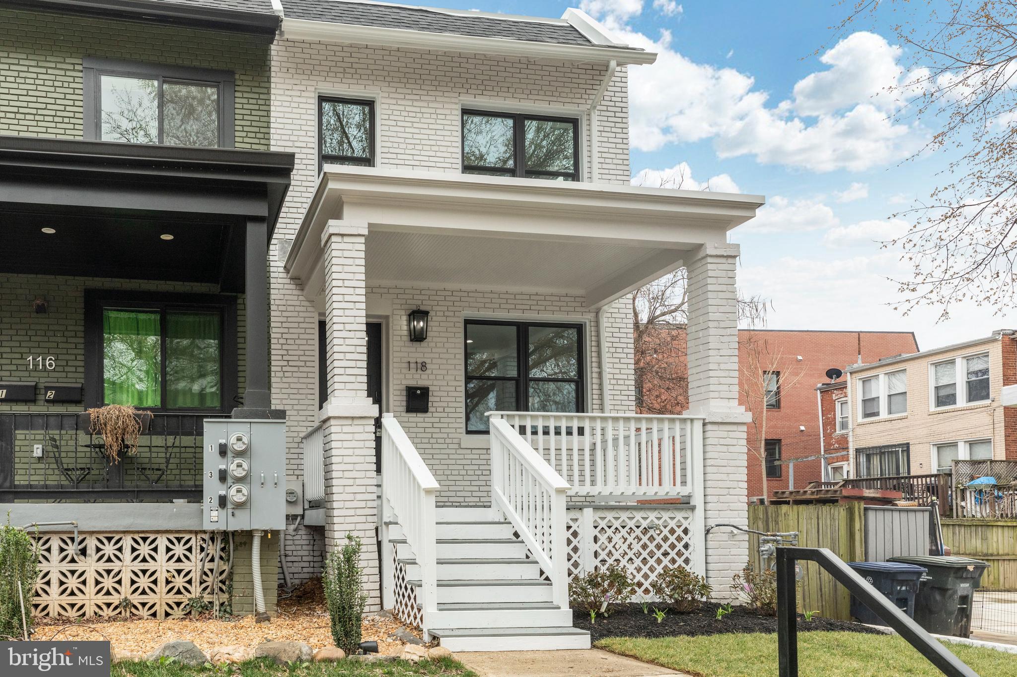 a front view of a house with a porch