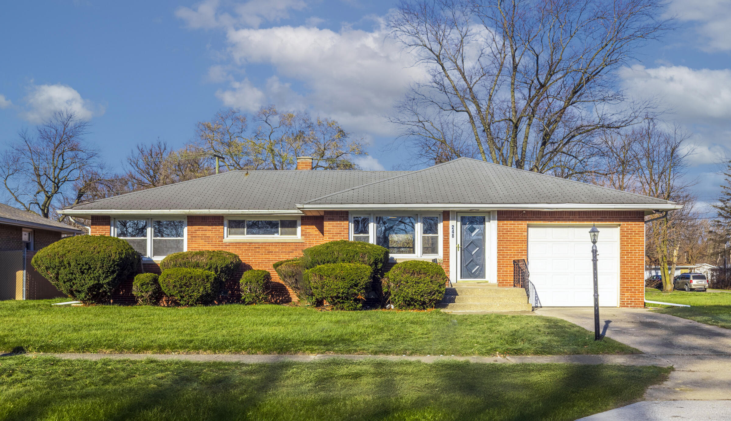 a view of a house with a garden