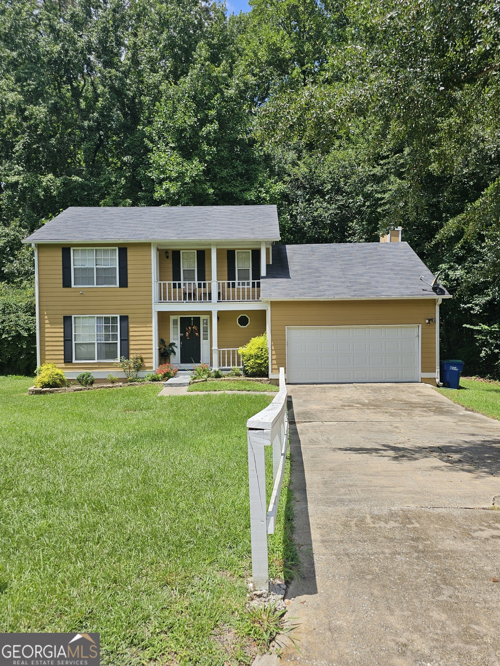 a view of a house with a swimming pool