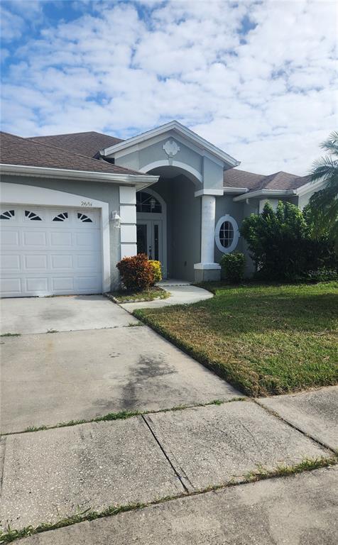 front view of a house with a yard