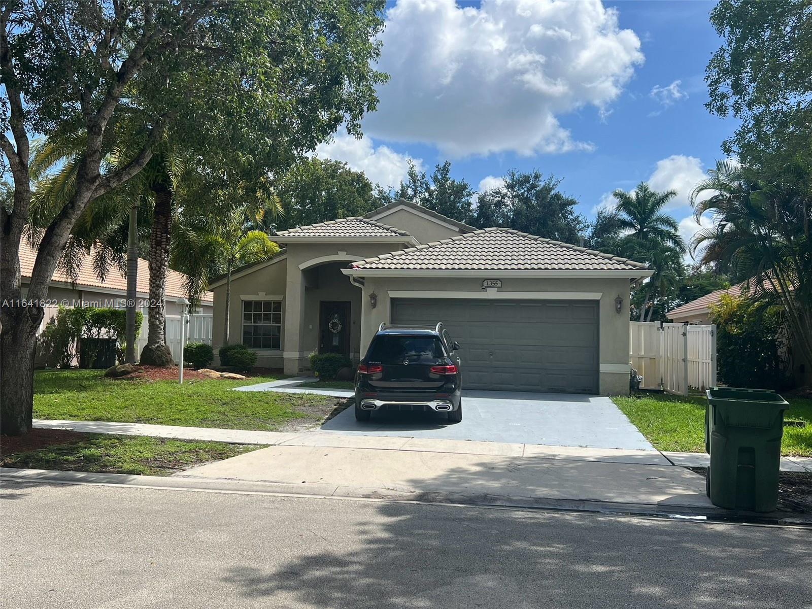 a car parked in front of a house