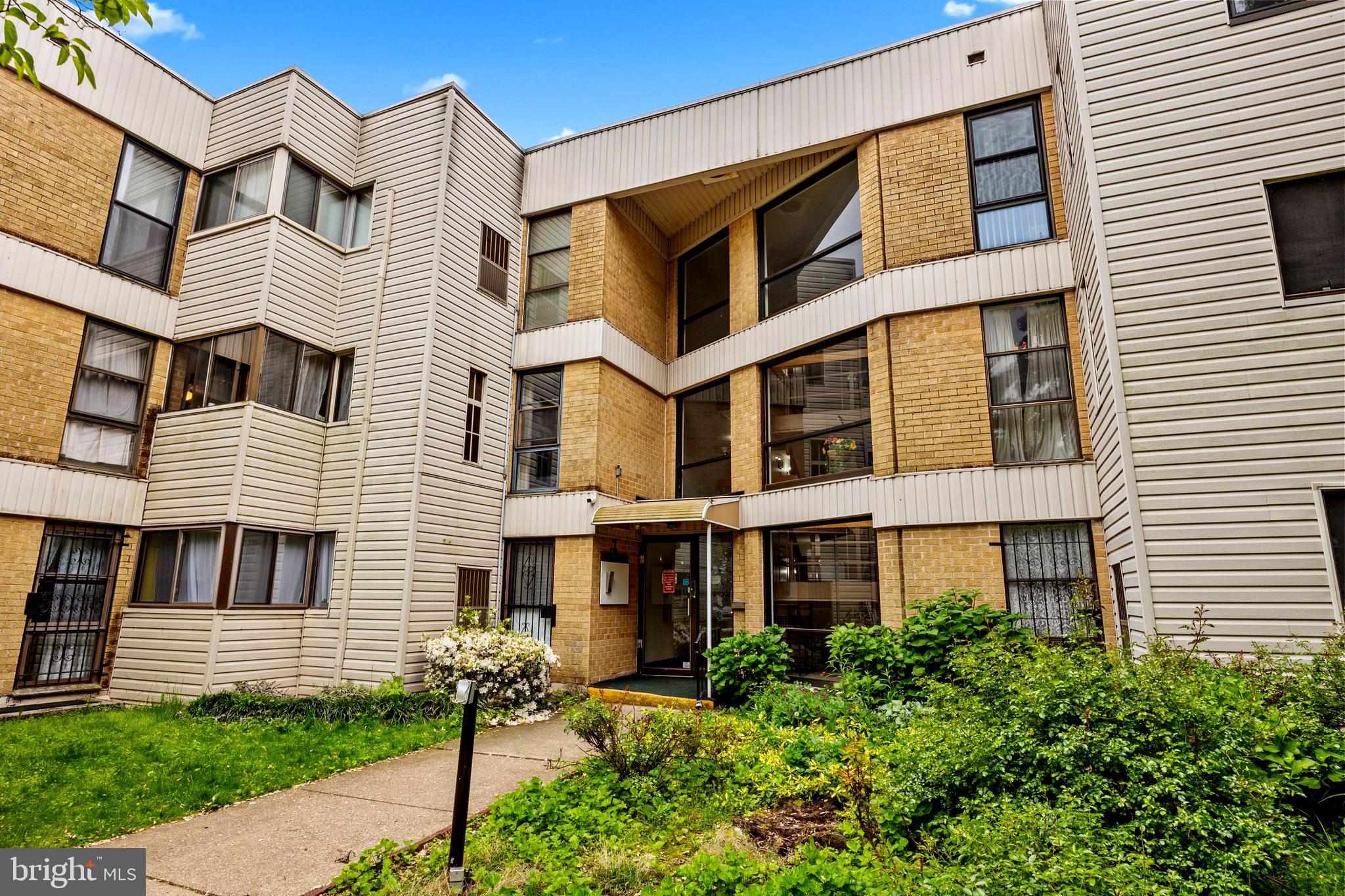 a front view of a multi story residential apartment building