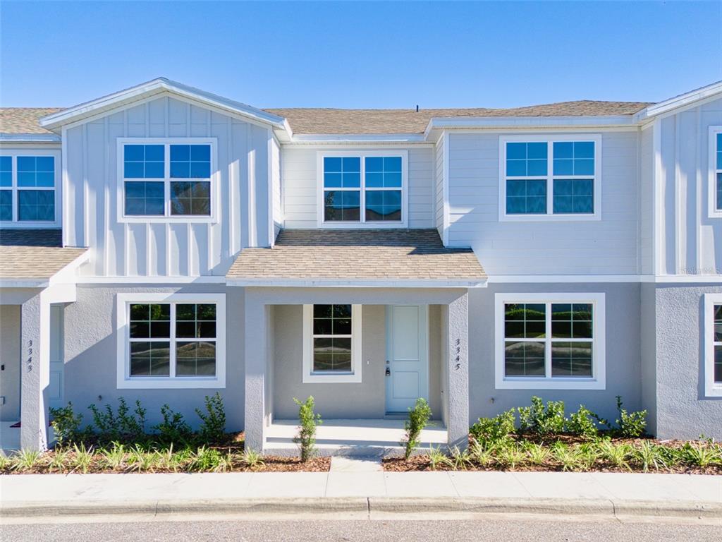 a front view of a house having yard