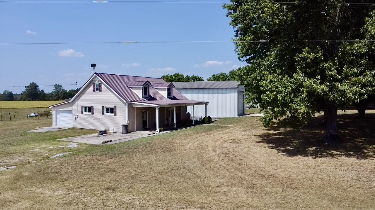 a house with trees in the background