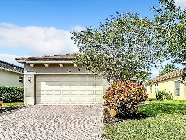 $372,500 | 310 Southwest Tomoka Springs Drive | St. Lucie West Country Club