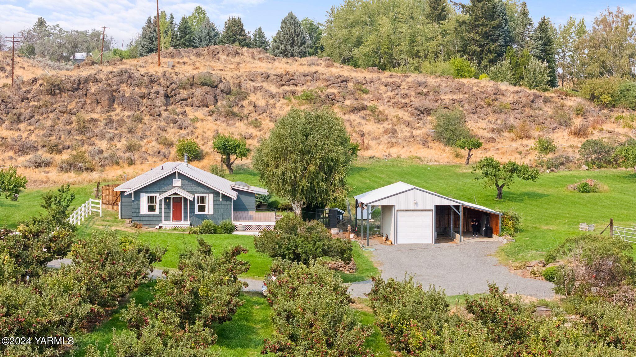 a house view with a garden space