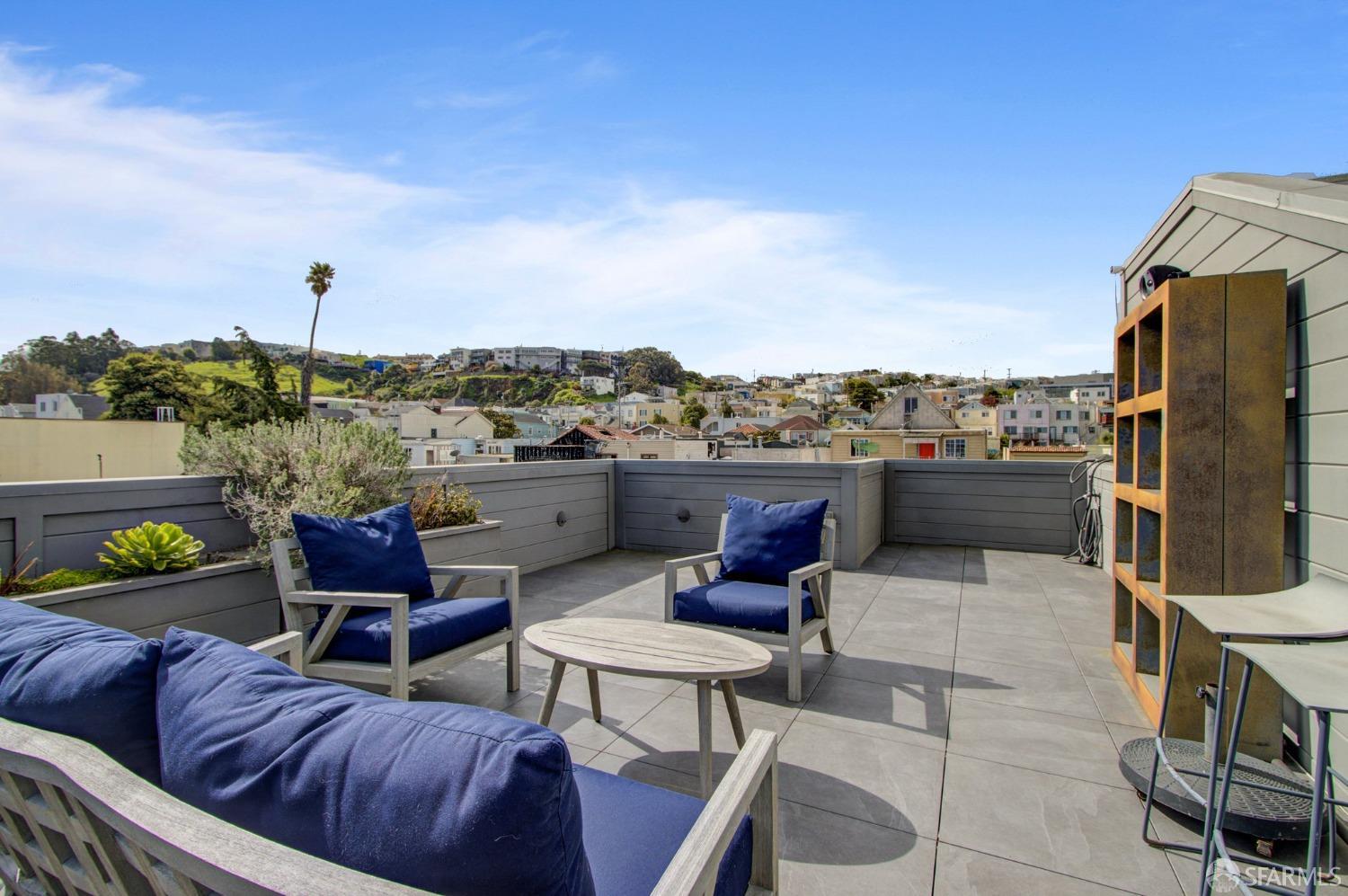 a terrace view with sitting space