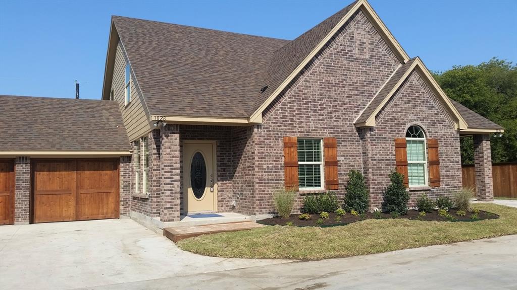 front view of a house with yard