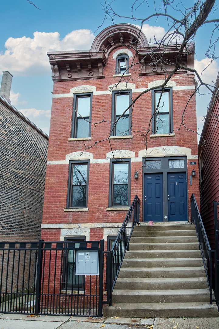 a front view of a multi story residential apartment building