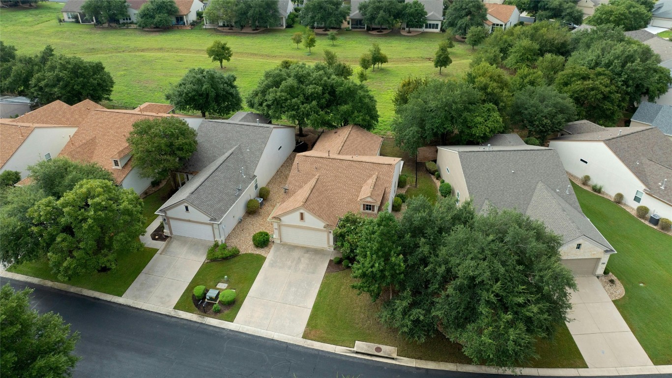 an aerial view of a house with outdoor space pool patio and outdoor seating