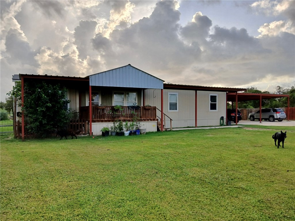 a front view of house with yard