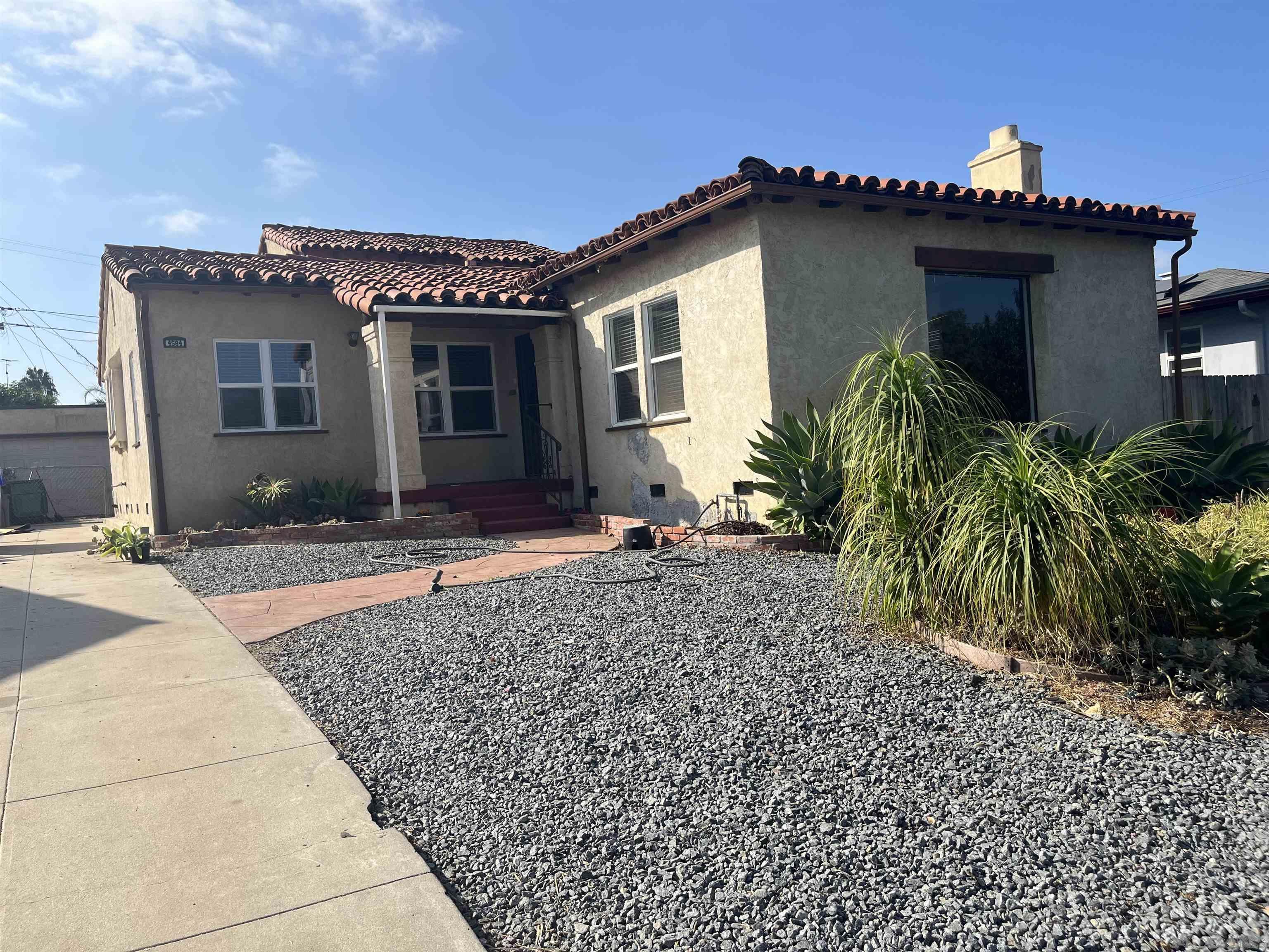 a view of a house with a patio