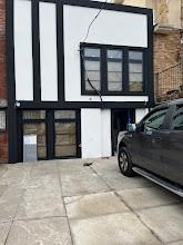 a car parked in front of a building