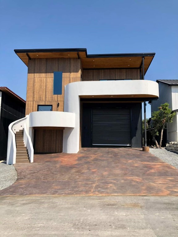 a front view of a house with yard