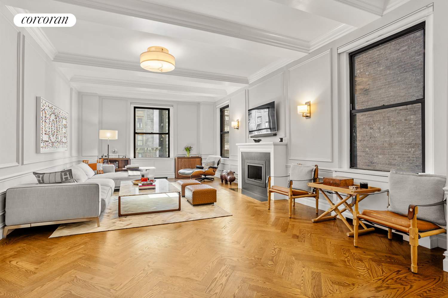 a living room with furniture and a fireplace