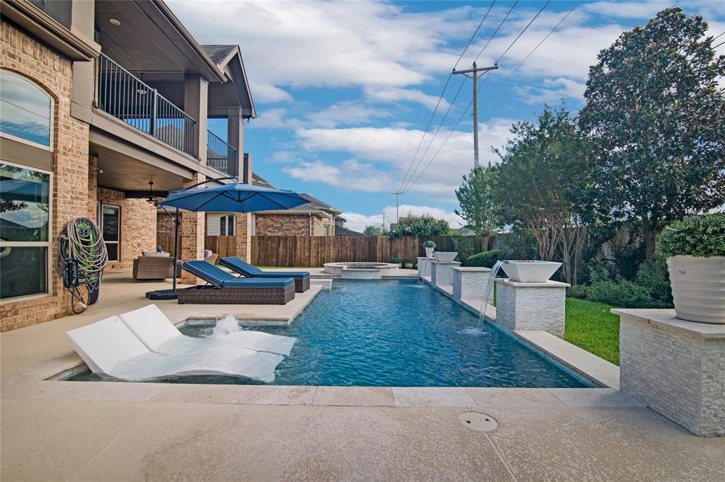 a view of a backyard with a patio