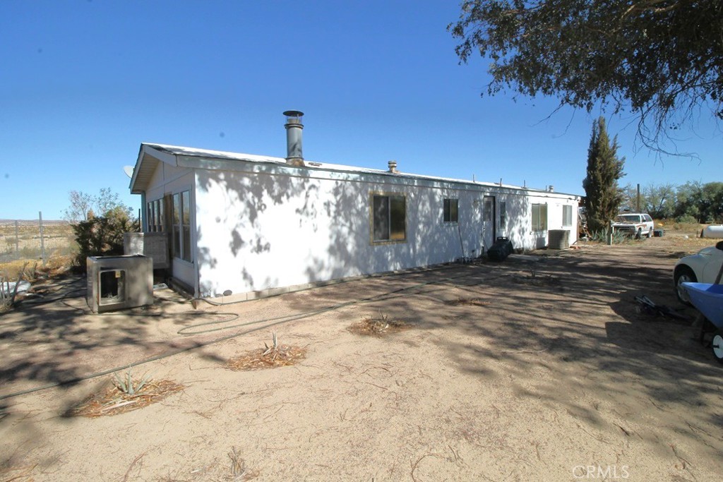 a view of a backyard of a house