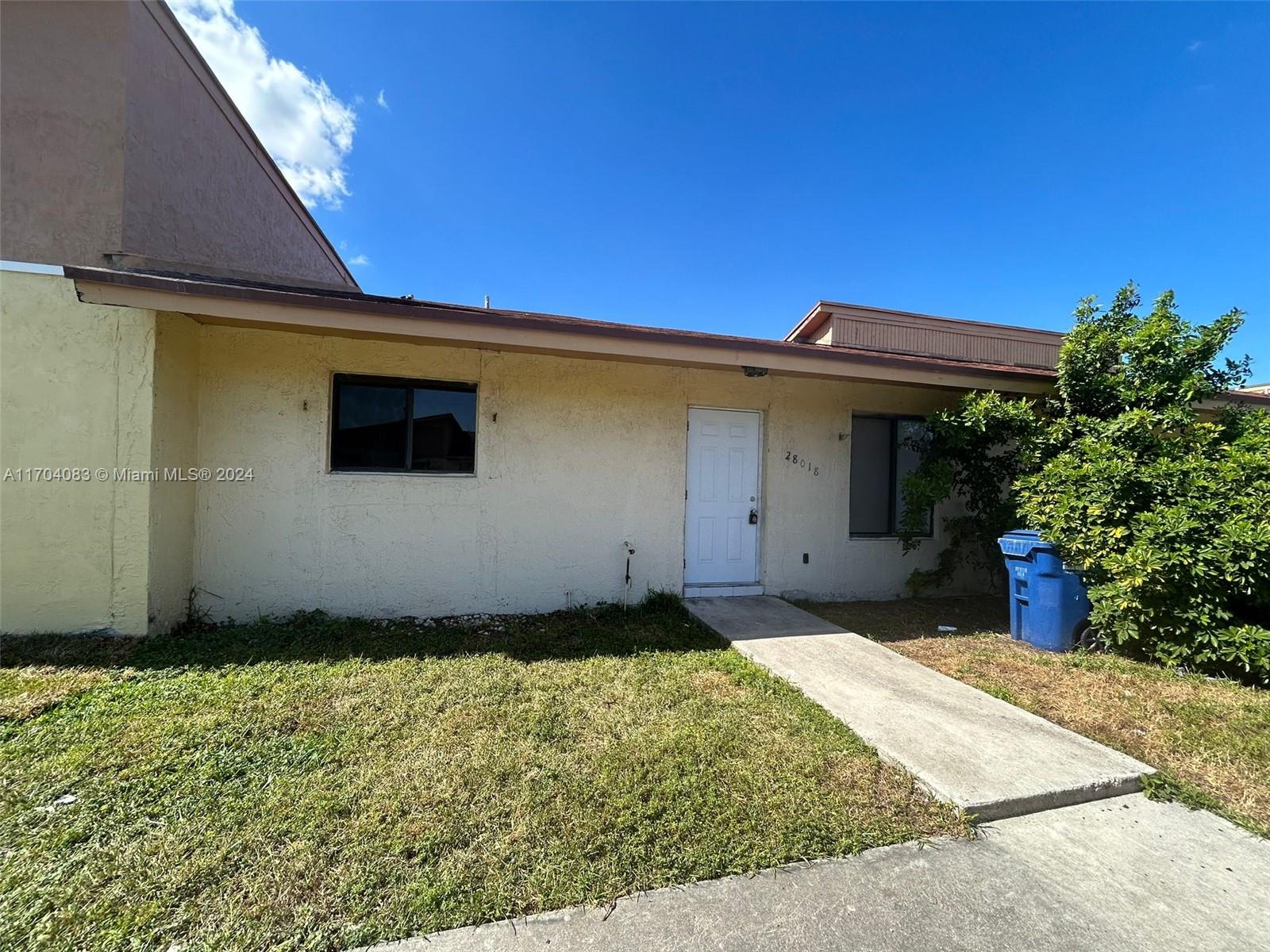 a front view of house with yard