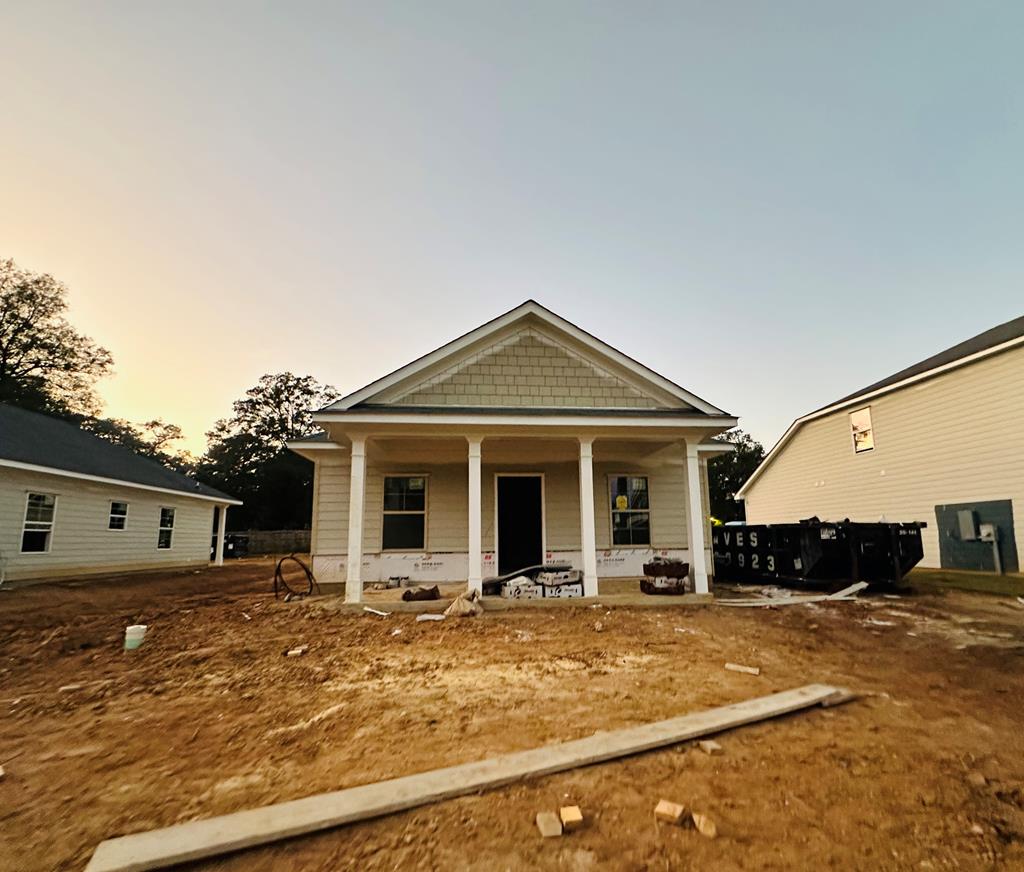 front view of a house with a yard