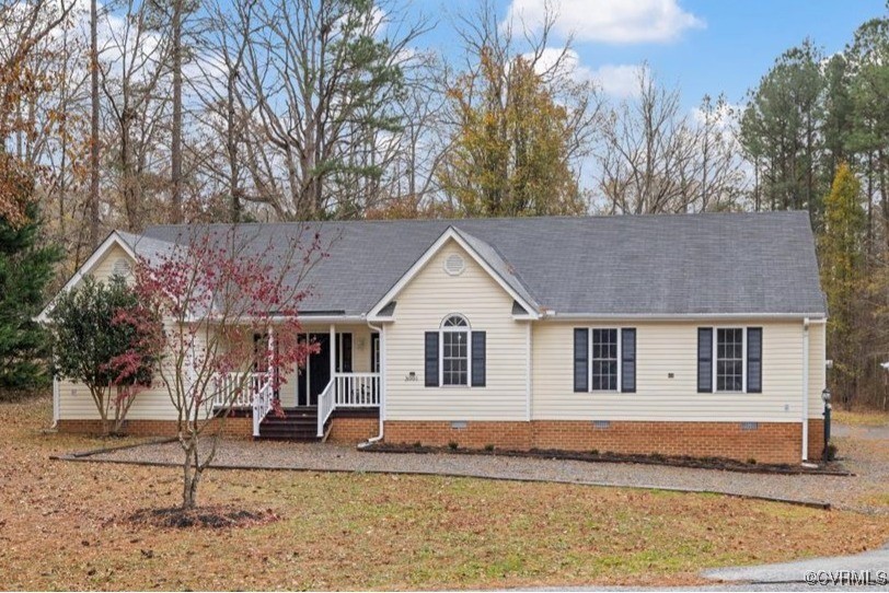 a house with trees in the background