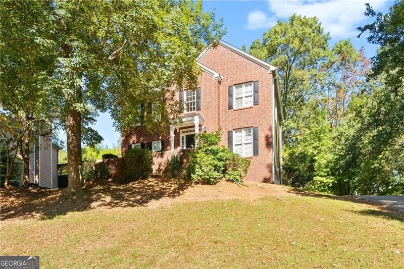 Front facade with a front lawn