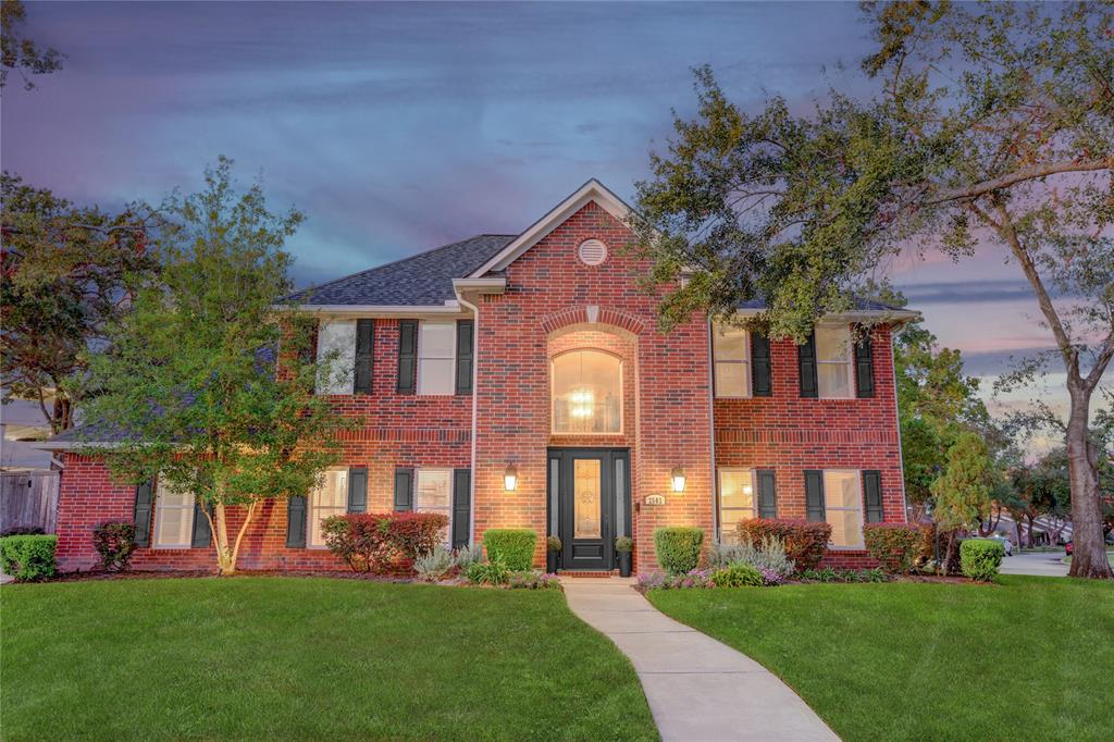 Beautifully lit at night. The corner lot is oversized with great landscaping and offers. Features not available in the marketplace. Three car garage, sued bedrooms, game room, and study.