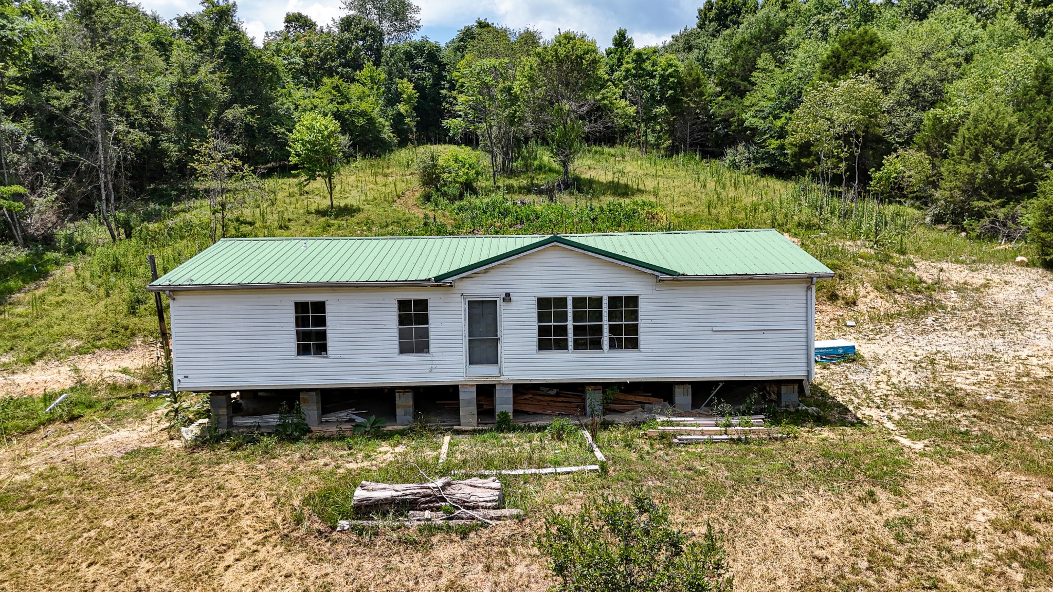 a house with trees in the background