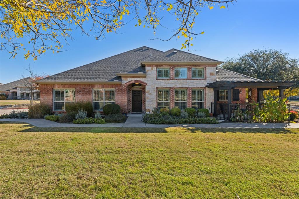 a front view of a house with swimming pool