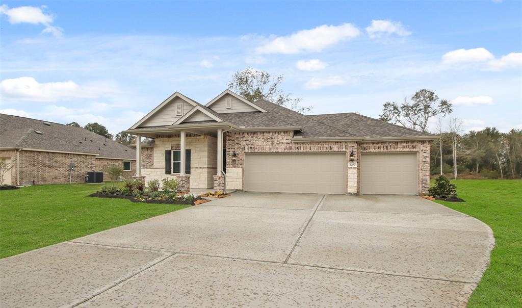 Stunning Juniper III design by K. Hovnanian Homes in elevation TA built in beautiful Tarkington Timbers.