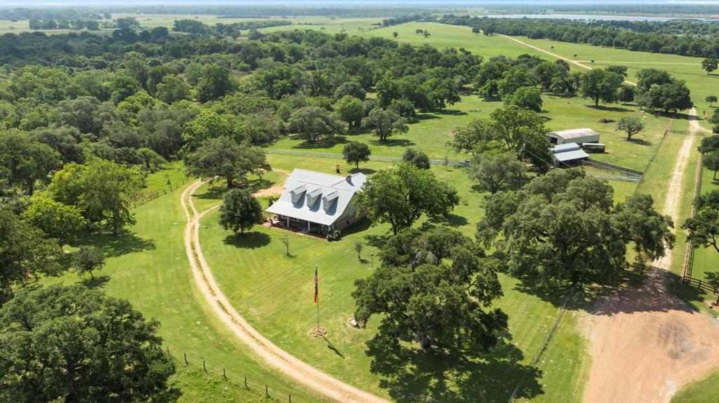 an aerial view of residential house with outdoor space