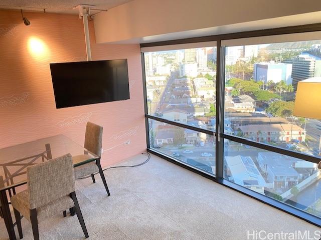 a view of a livingroom with furniture