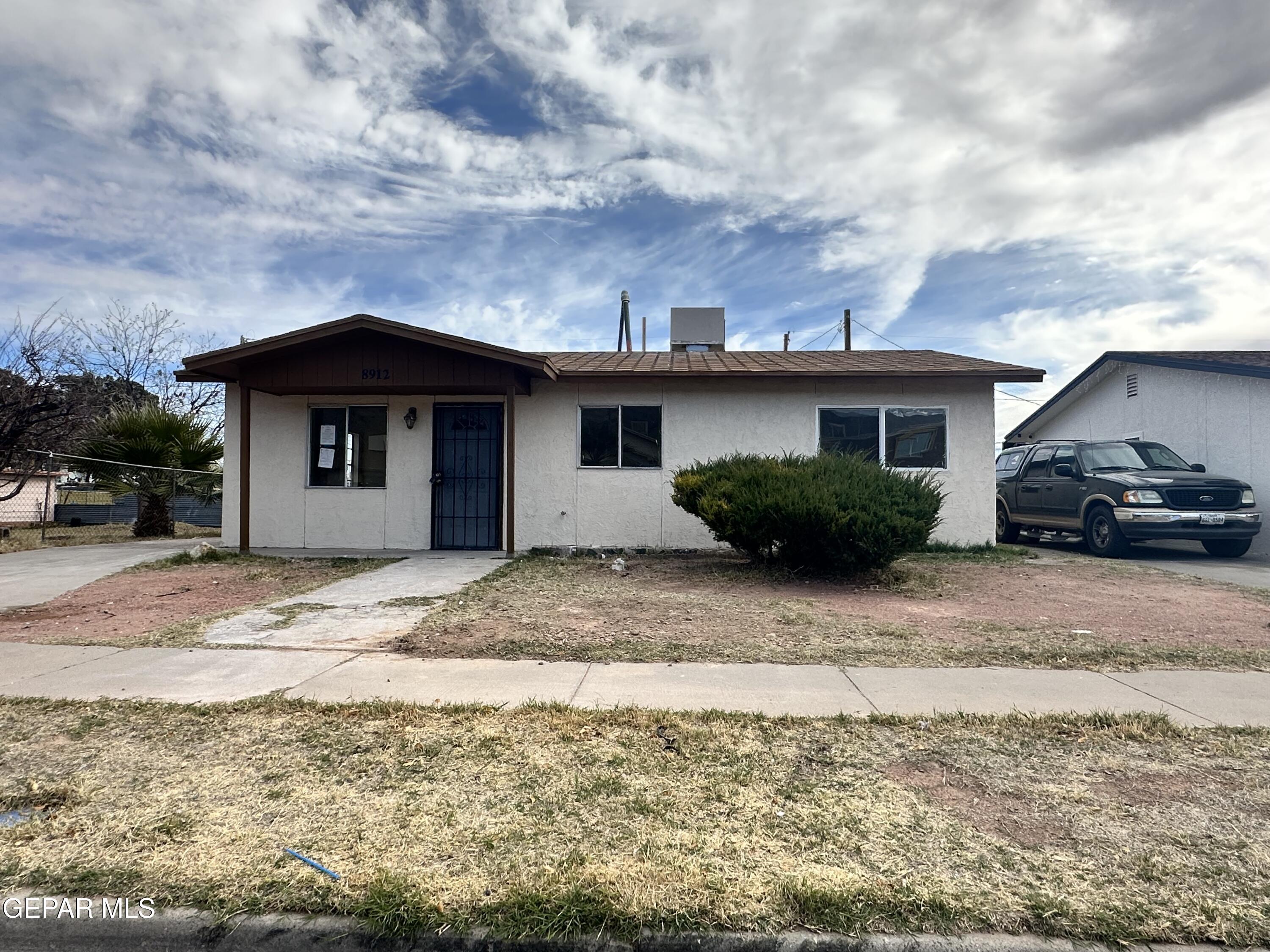 a view of a house with a patio