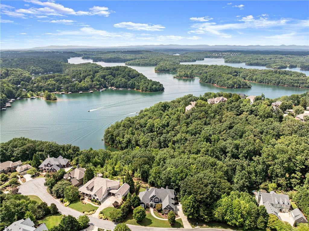 a view of a lake with a city