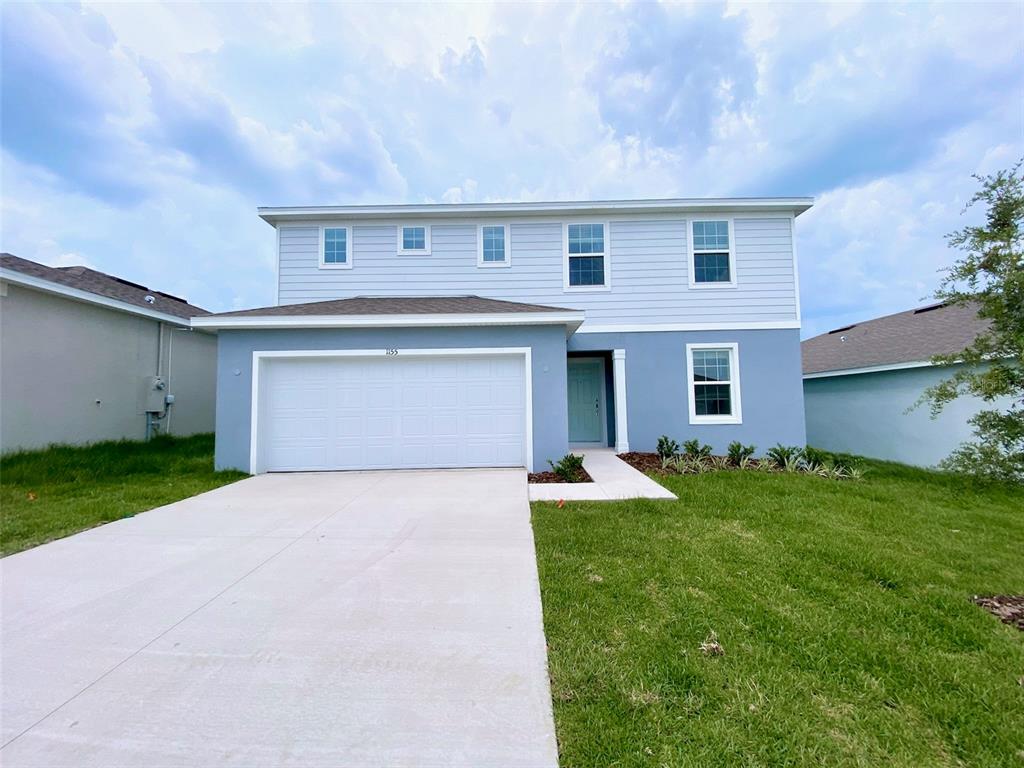 a front view of house with yard