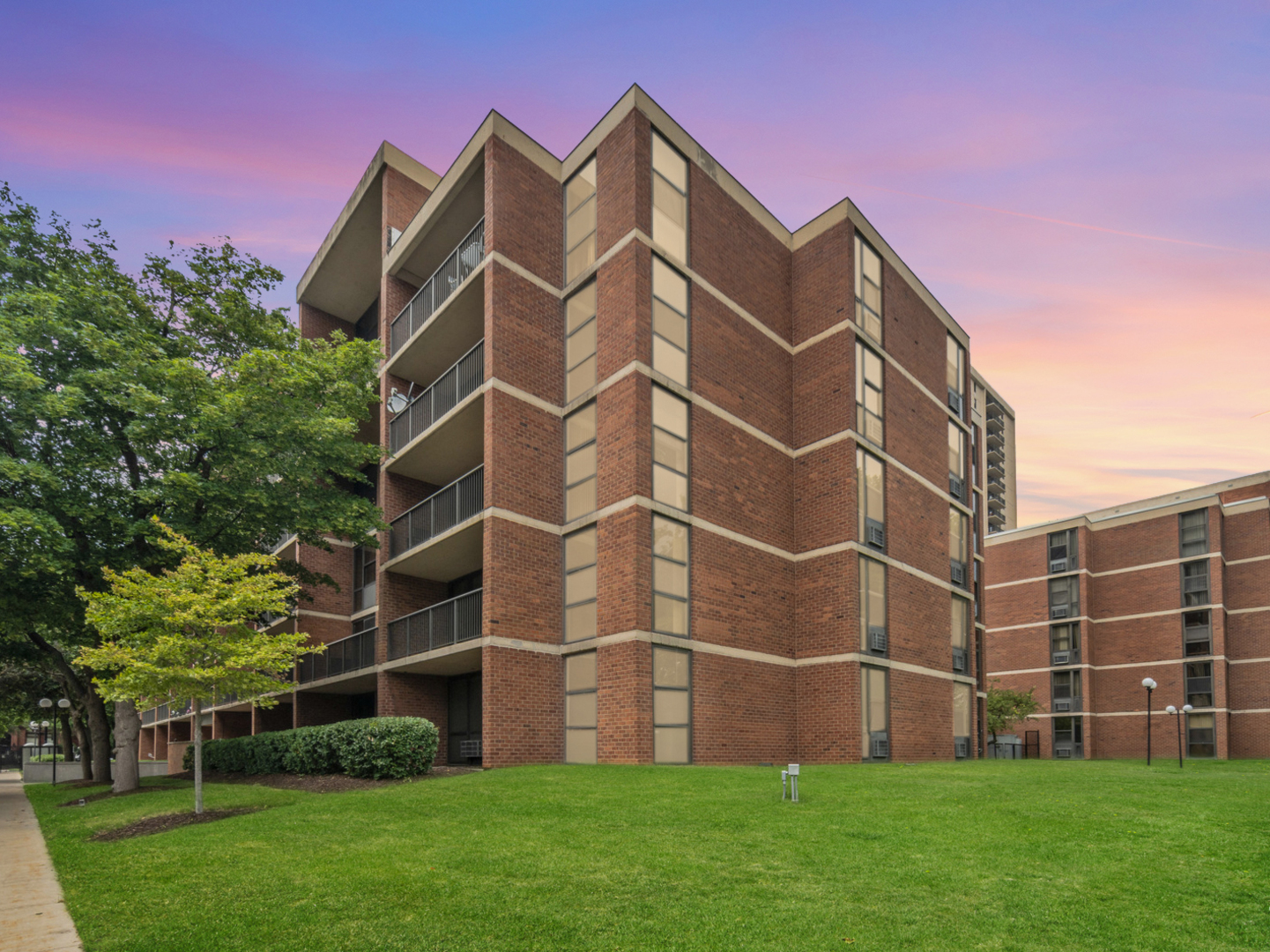 a view of building with yard