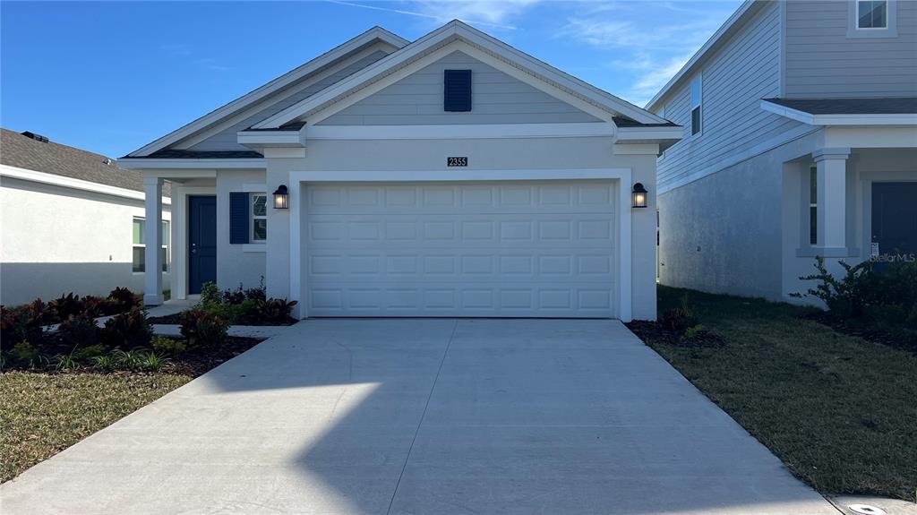 a front view of house with yard