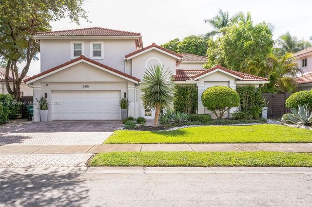 $1,689,000 | 6478 Northwest 113th Place | Doral Isles