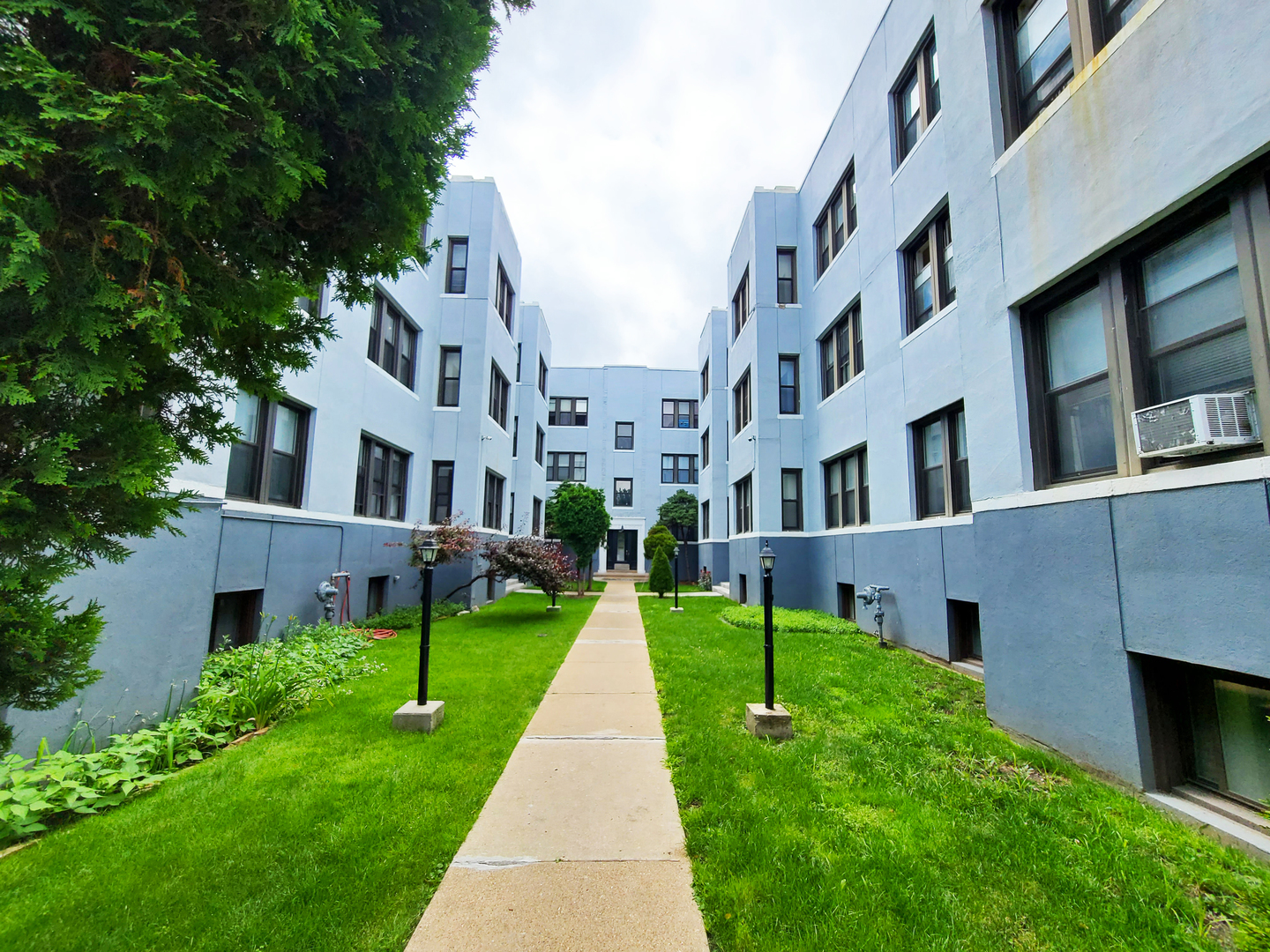 a view of building with yard