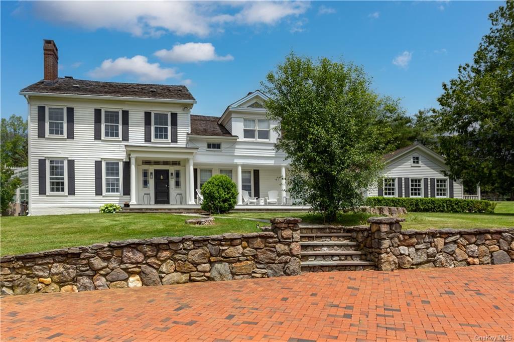 Now for rent is one of Quaker Hill's most prestigious estate homes.