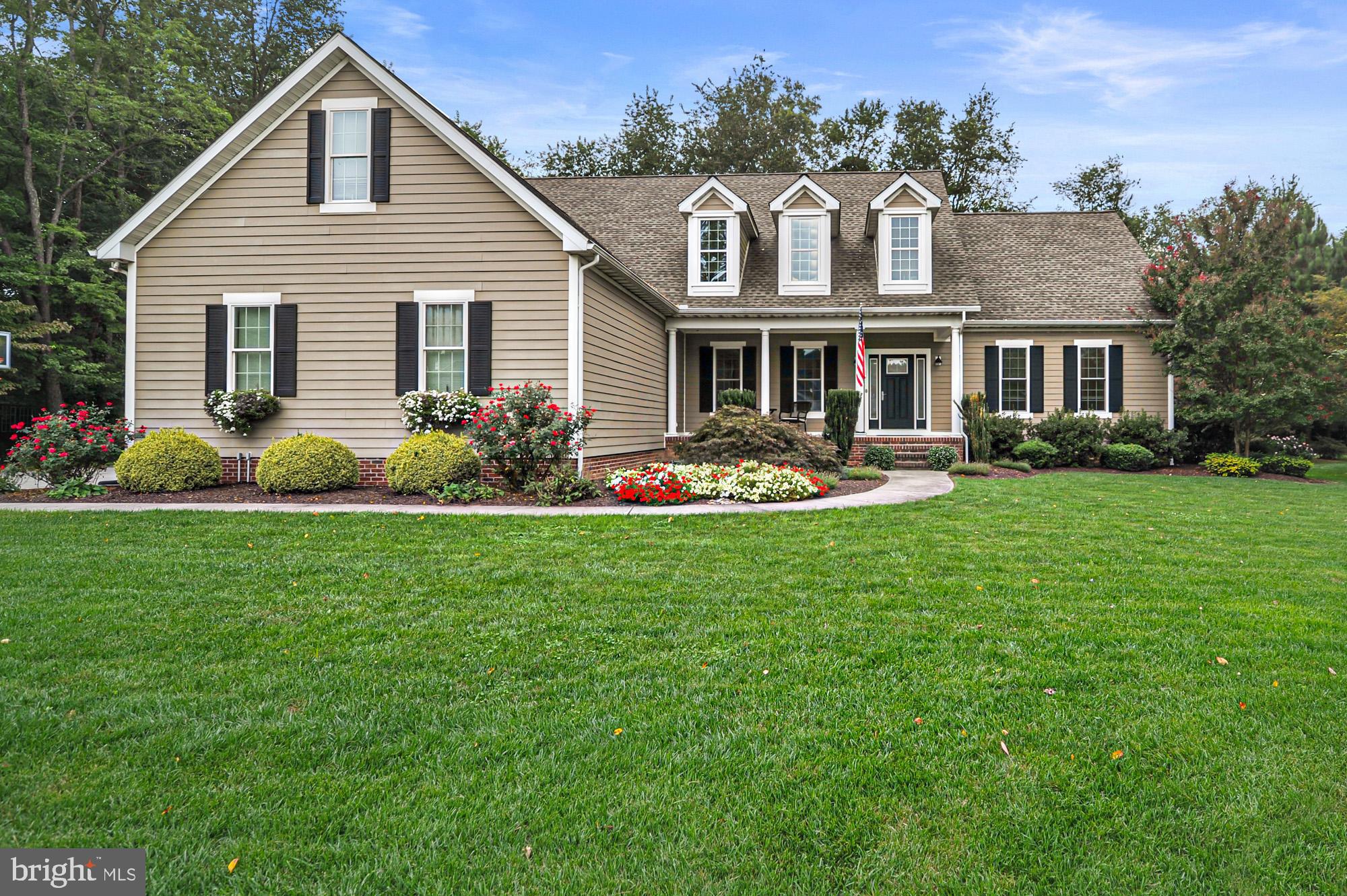 a front view of house with yard