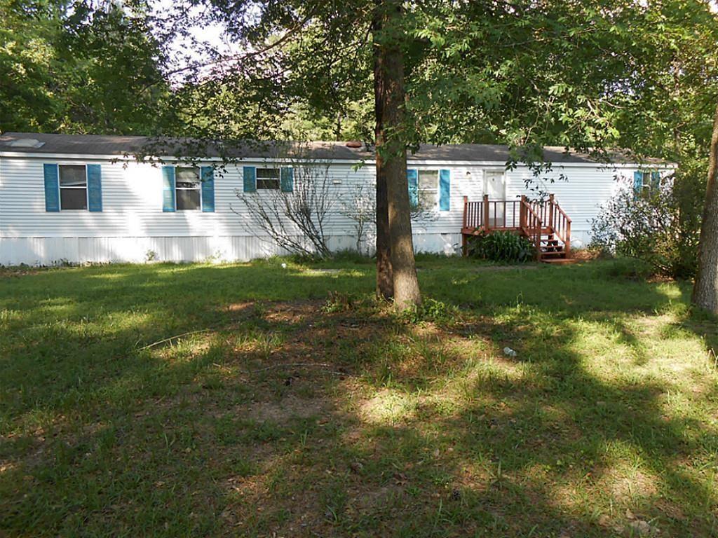 a view of backyard with green space