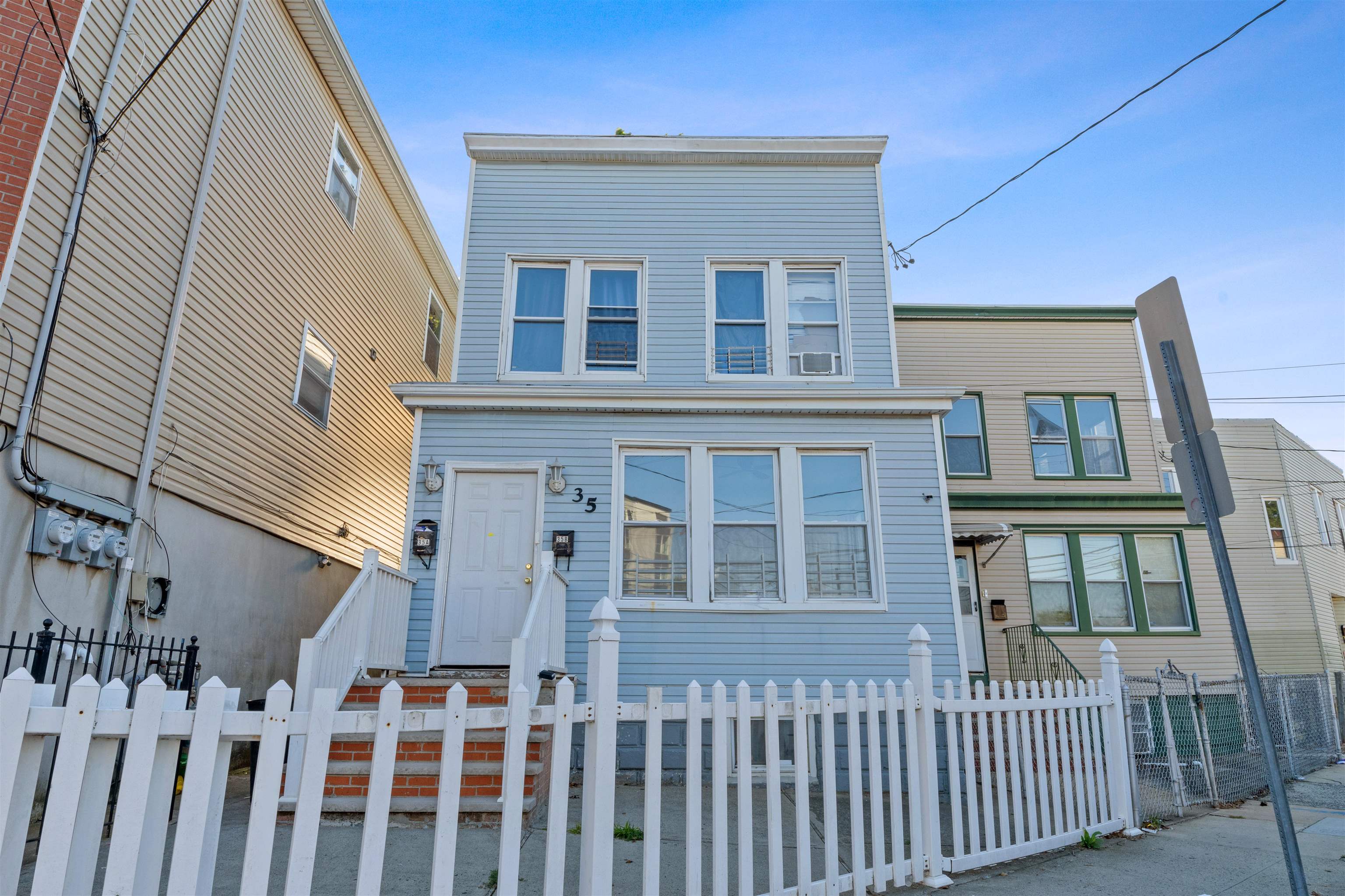 a front view of a house with a porch