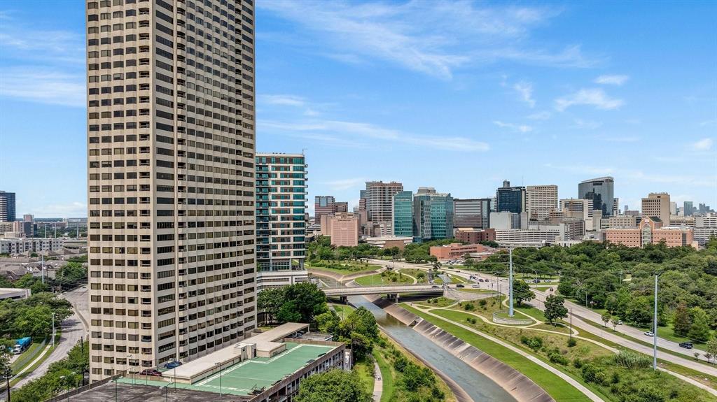 a view of a city with tall buildings