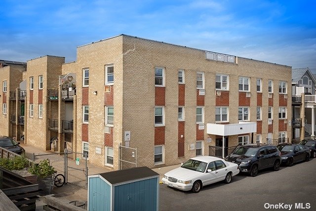 a car parked in front of a building