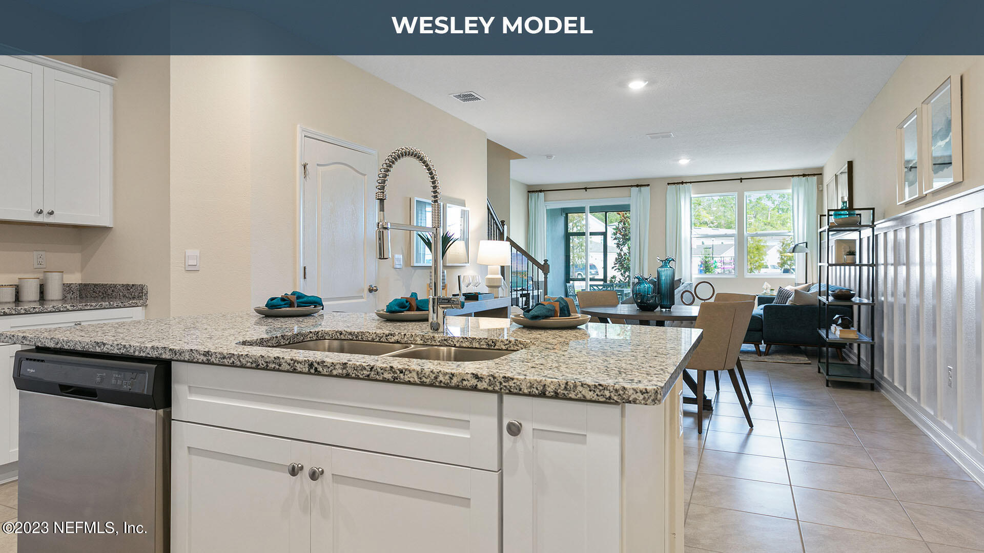 a view of living room with granite countertop furniture and window