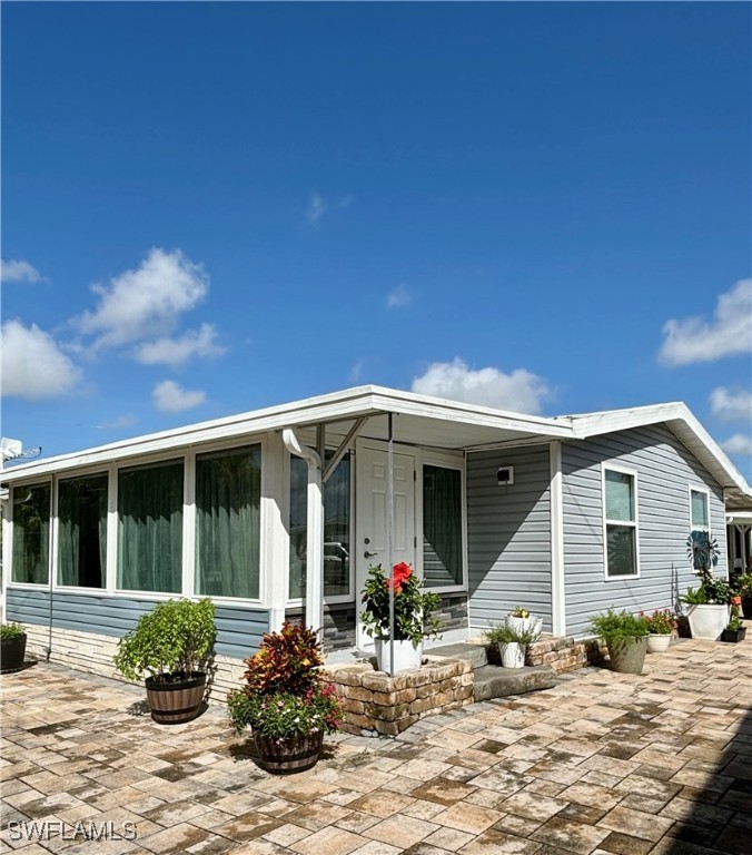 a view of a house with a patio