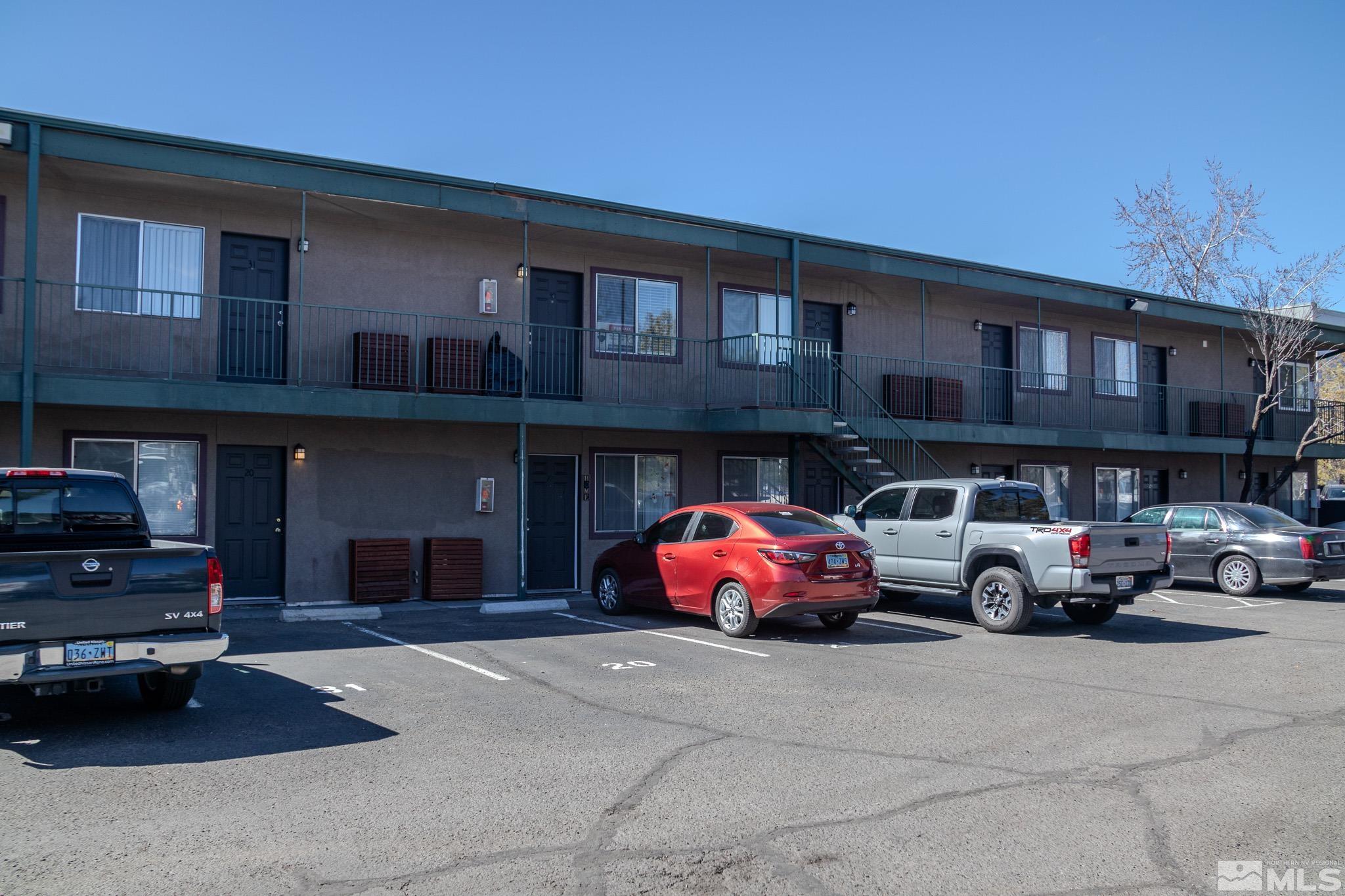 a cars parked in front of a building