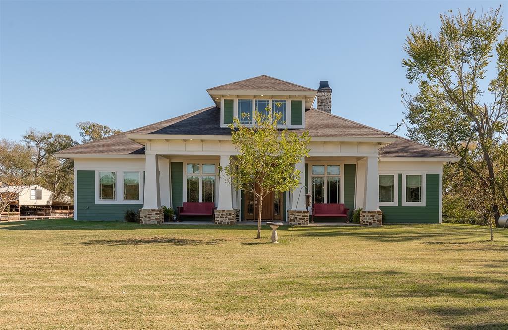 Eye-catching Craftsman architecture with a welcoming front porch!