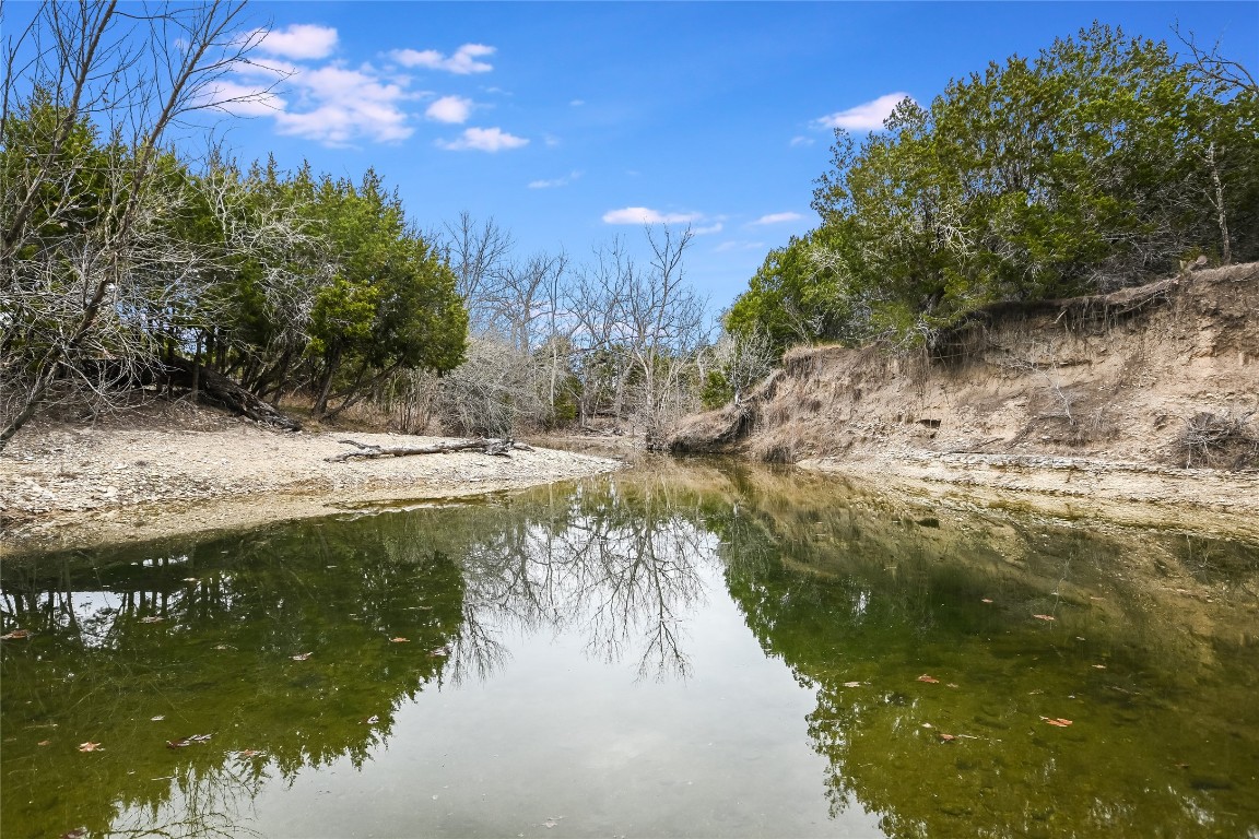 a view of a lake from a yard